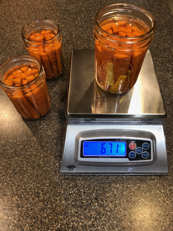 weighing carrots