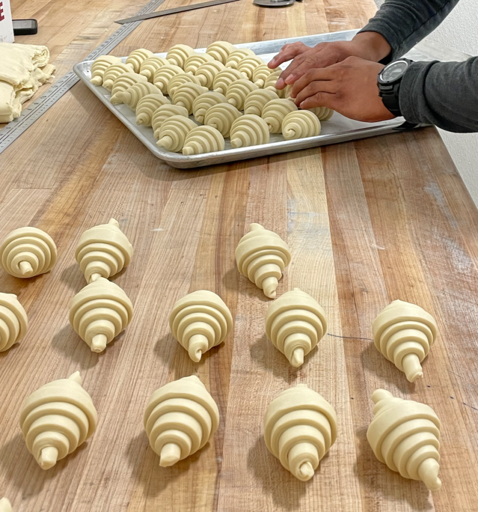 croissants on table after being rolled